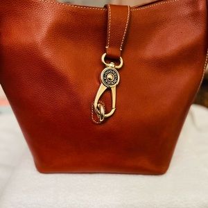 Dooney and Bourke Logo Lock Pebble Leather Shoulder Bag